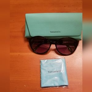 Authentic Tiffany & Co sunglasses with diamond point accents.